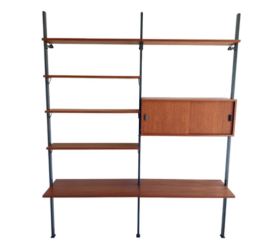 Mid Century, modular teak wall shelf by Olof Pira for String, 1950s