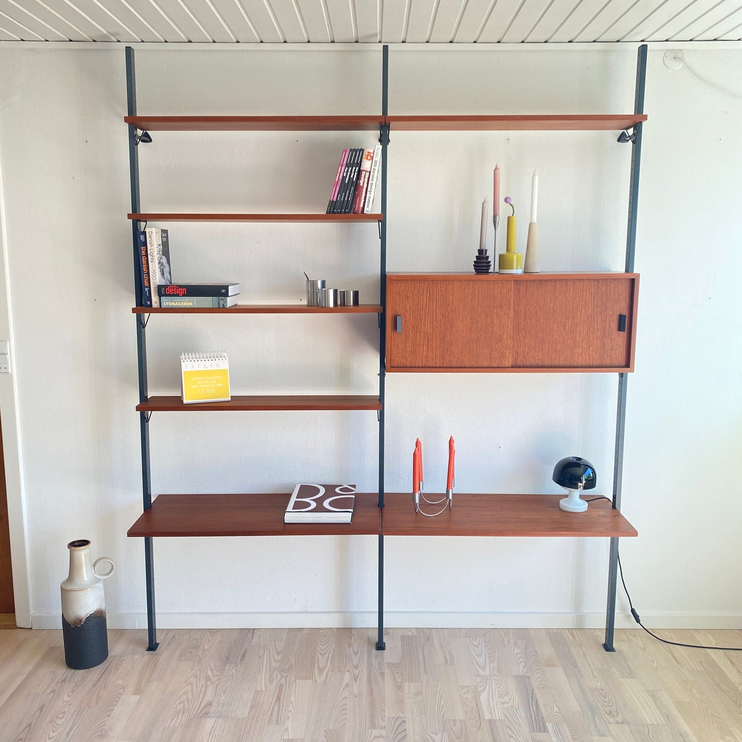 Mid Century, modular teak wall shelf by Olof Pira for String, 1950s