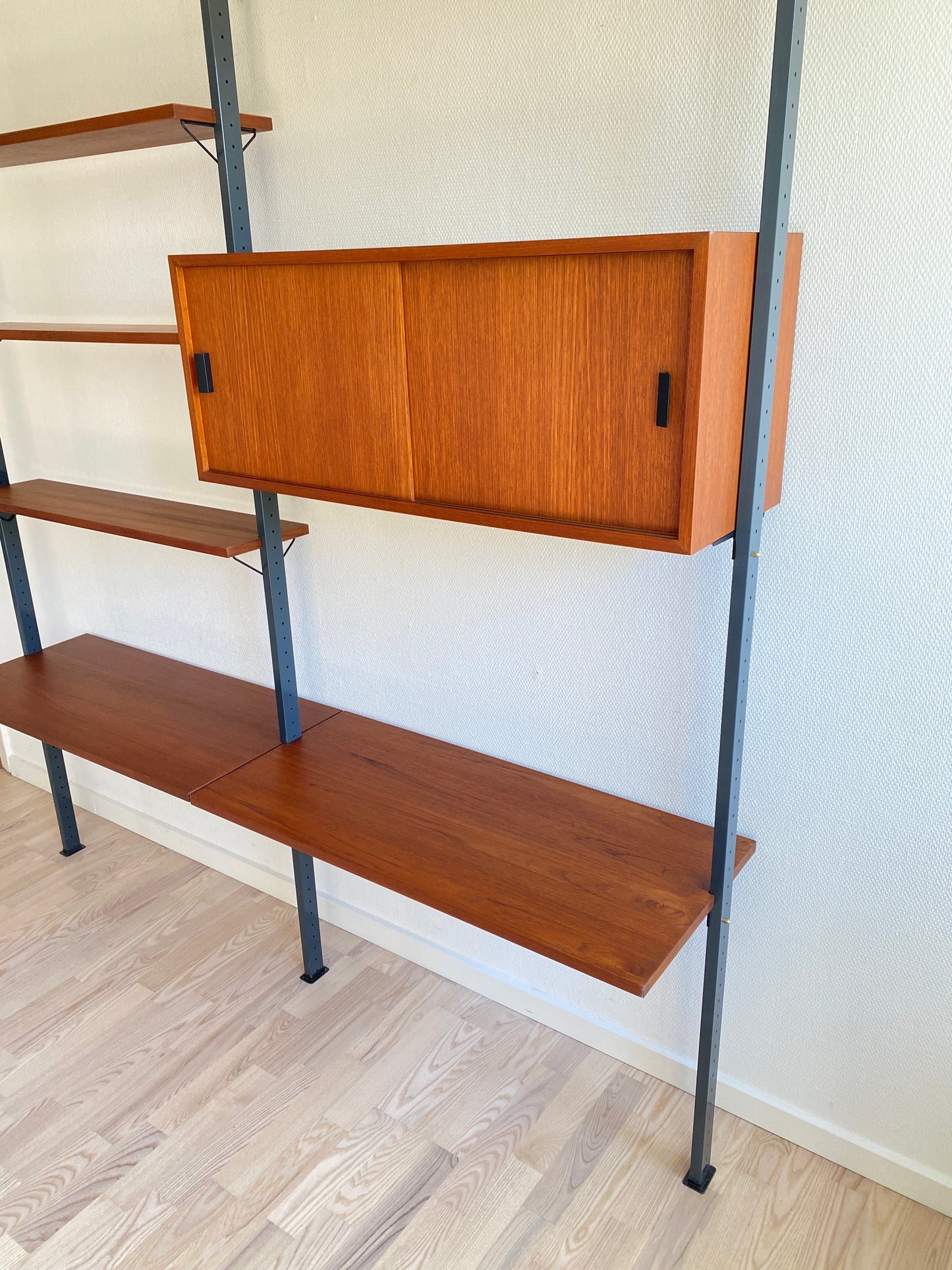 Mid Century, modular teak wall shelf by Olof Pira for String, 1950s