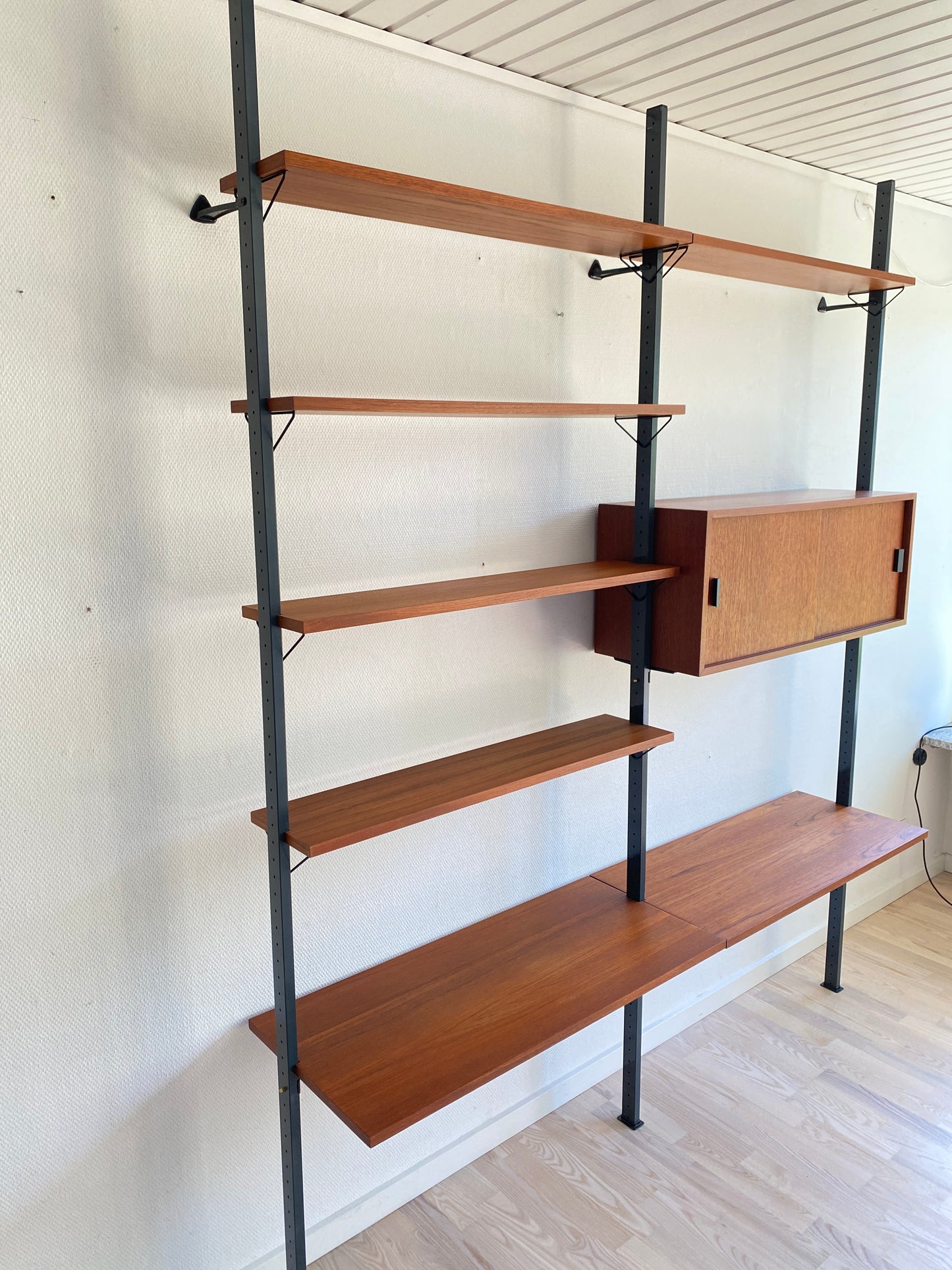 Mid Century, modular teak wall shelf by Olof Pira for String, 1950s