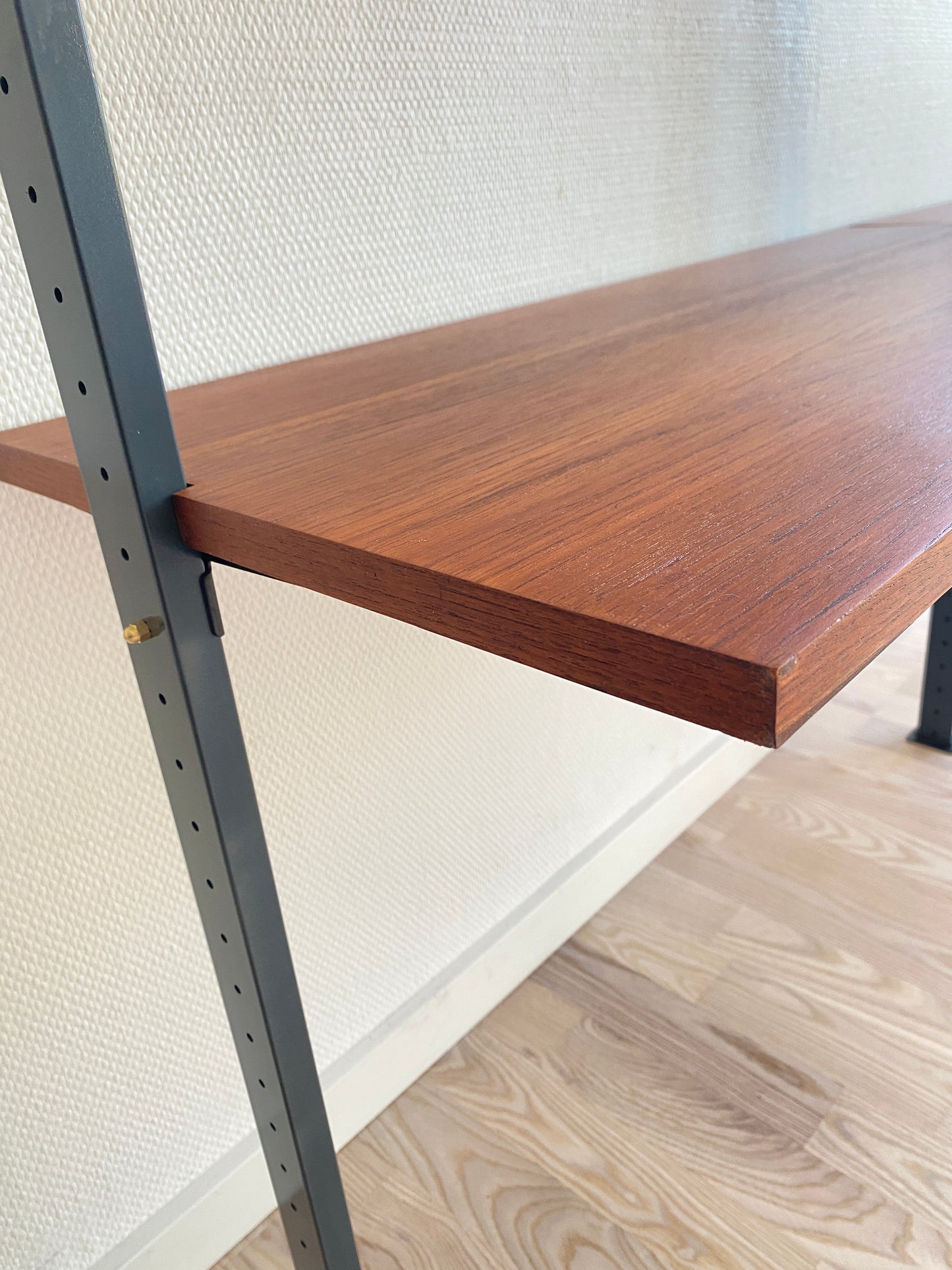 Mid Century, modular teak wall shelf by Olof Pira for String, 1950s